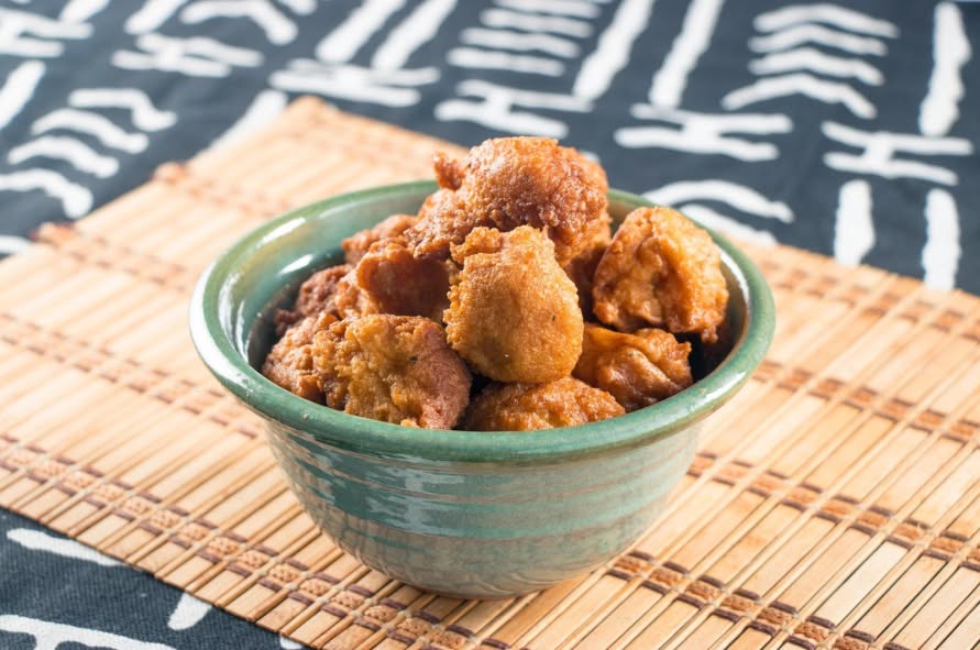 A bowl of delicious Liberian food, a dish from the Dekonti cookbook